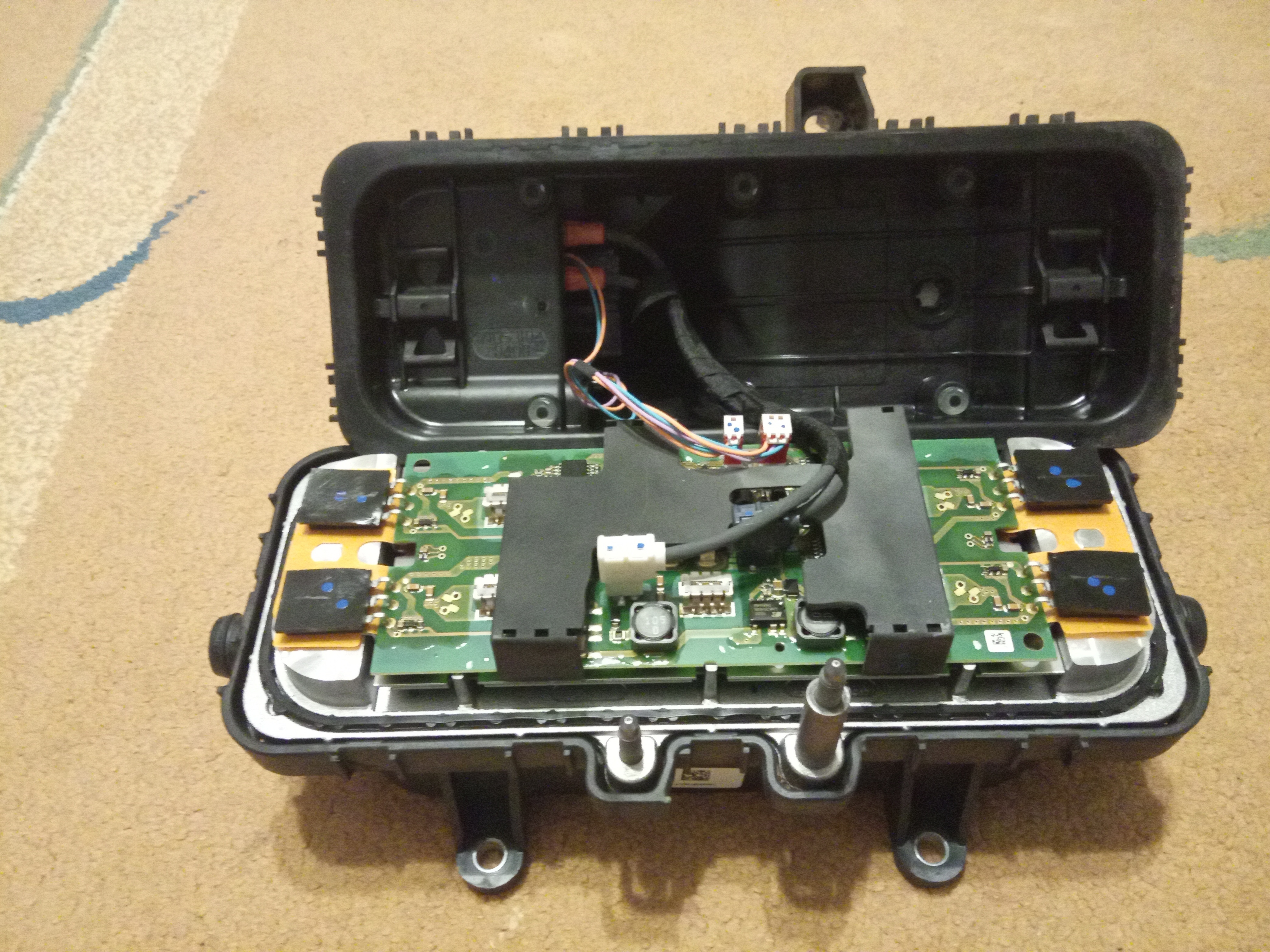 Opened heater after removing housing clips.